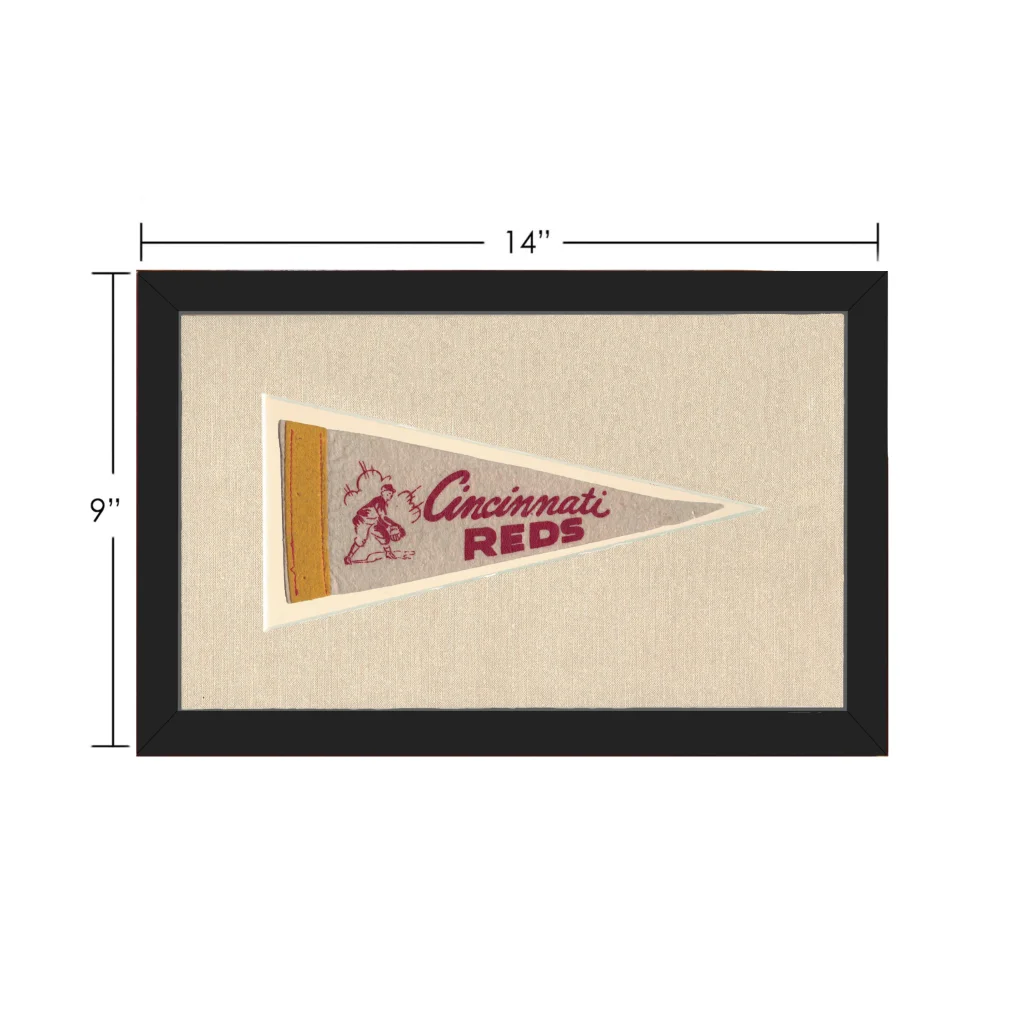 Vintage Cincinnati Reds pennant framed on beige background