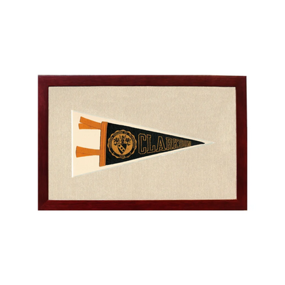 Vintage Clarkson College black and gold pennant in wooden frame