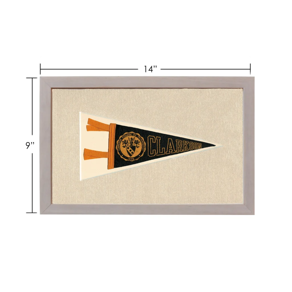 Vintage Clarkson College pennant framed with black field and gold emblem