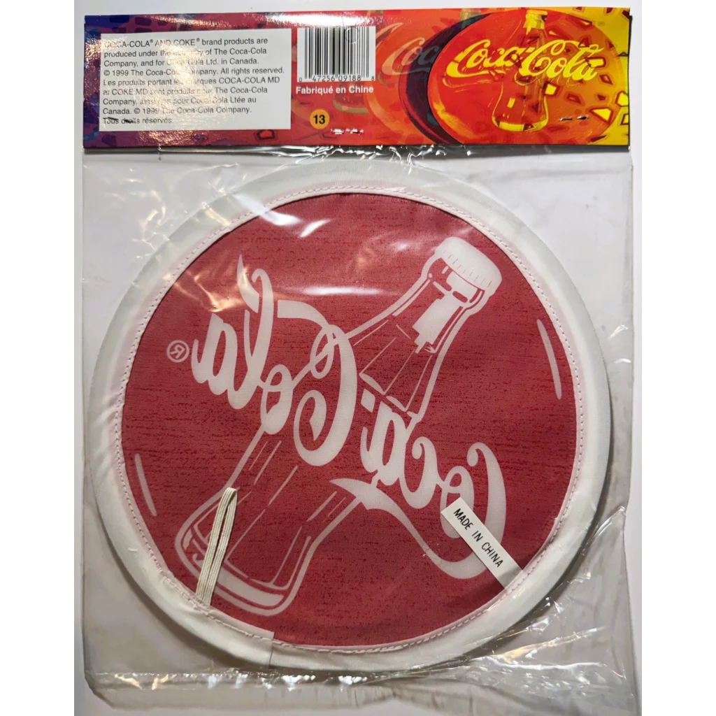 Coca-Cola themed round coaster in packaging for vintage NOS soda memorabilia flexible cloth frisbee