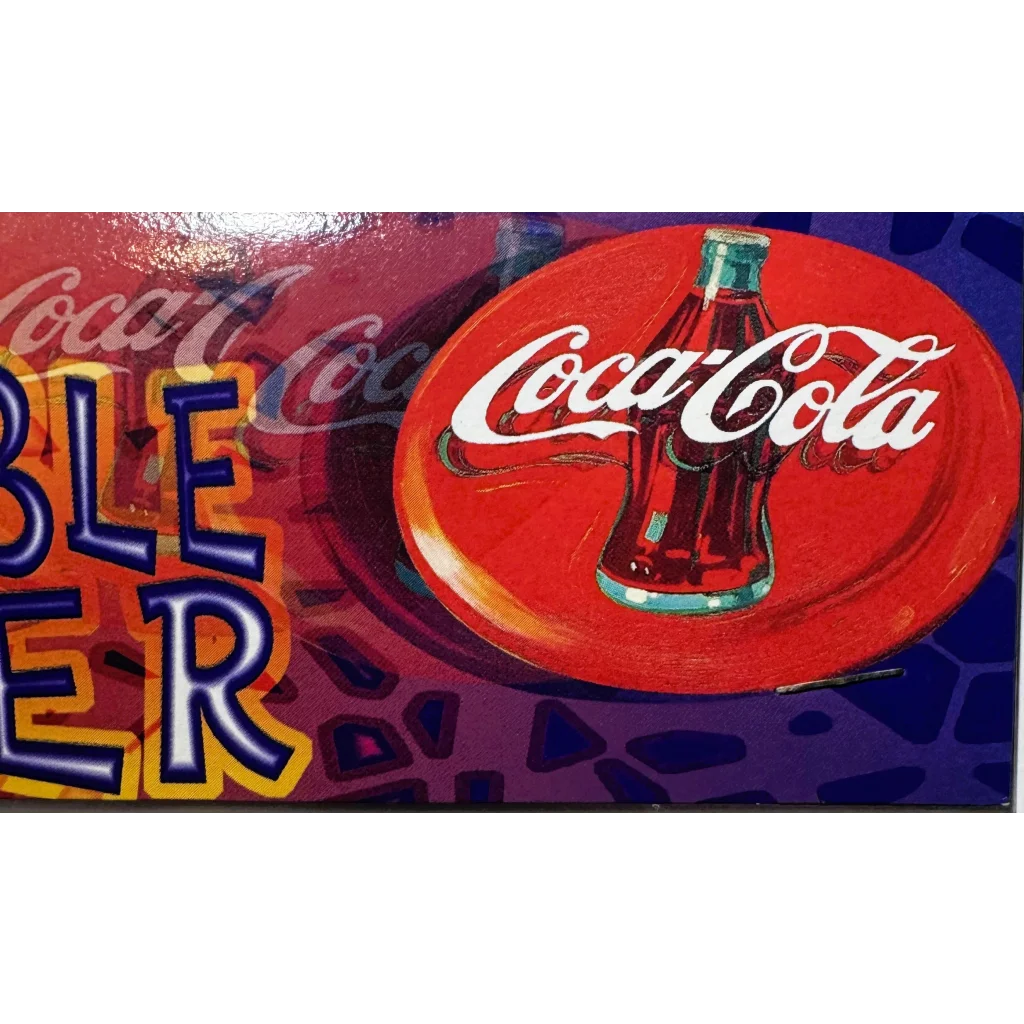 Coca-Cola bottle on red plate from vintage flexible cloth frisbee NOS soda memorabilia