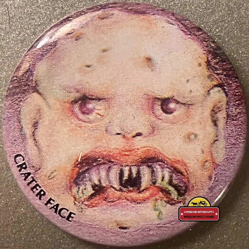 Grotesque Crater Face with sharp teeth on the Radical 80s Garbage Pail Kids Face Pin