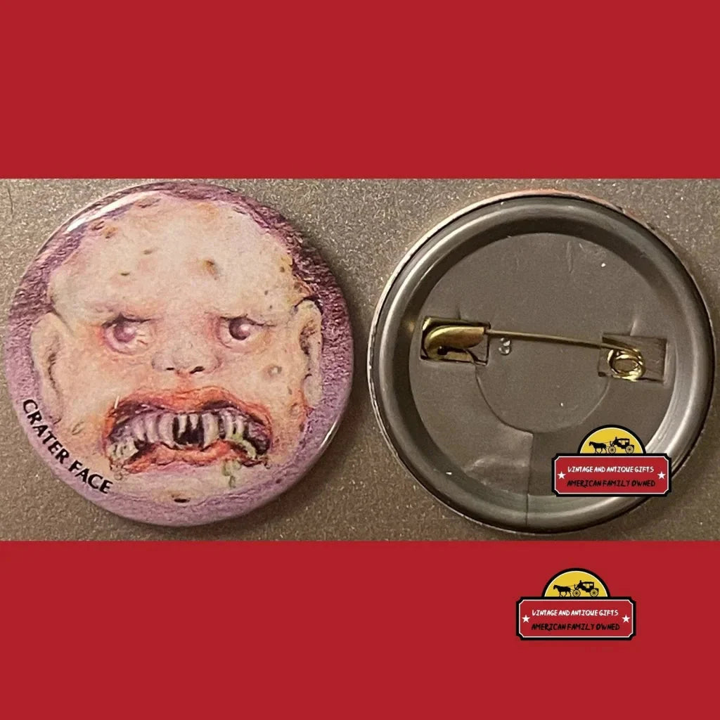 Radical 80s Garbage Pail Kids Crater Face Pin with a creepy face and sharp teeth