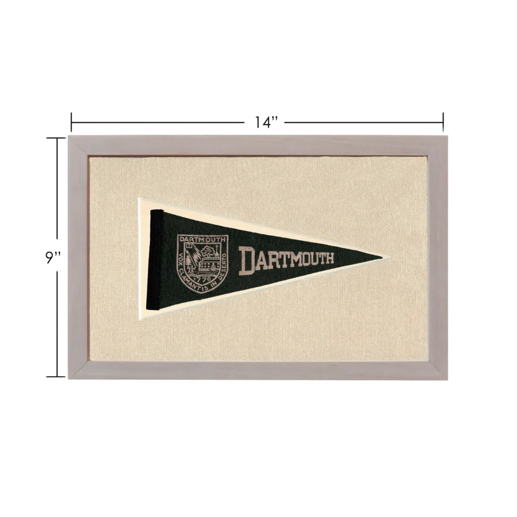 Vintage Dartmouth pennant framed in black and cream with crest