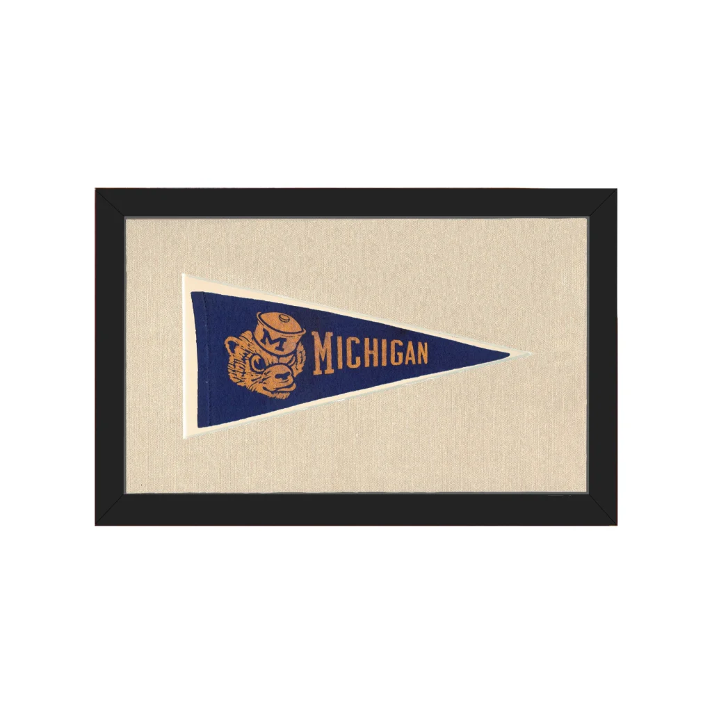 Vintage Dartmouth pennant with navy blue Michigan tan bear mascot