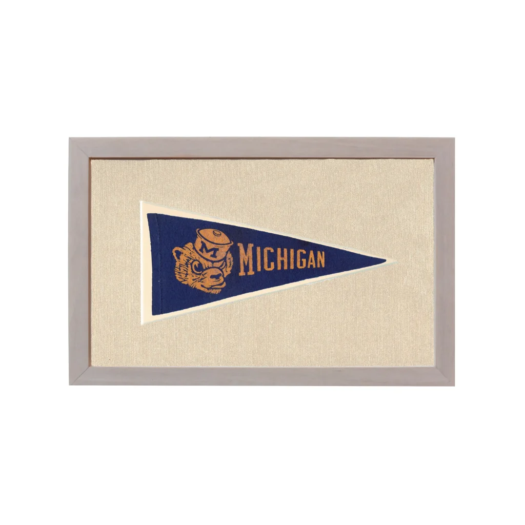 Vintage Dartmouth pennant with navy Michigan bear mascot in gray frame