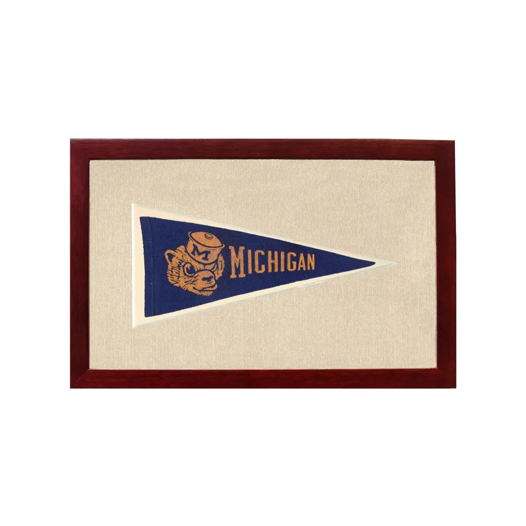 Vintage Dartmouth pennant with tan bear mascot in navy blue