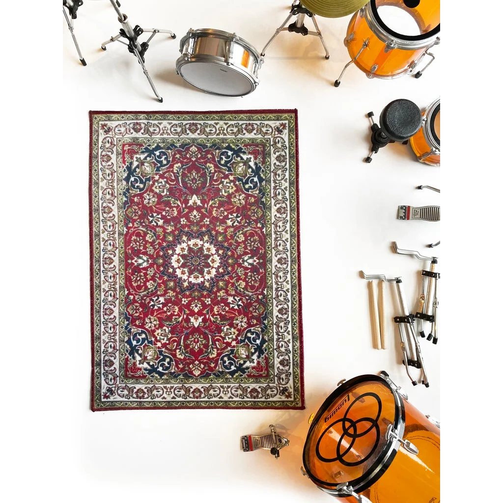 Vintage drum rug with red blue Persian pattern for scale drum kit display