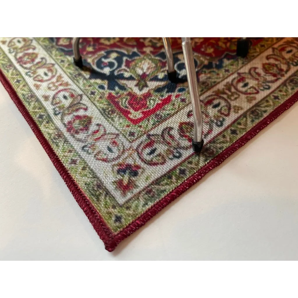 Vintage drum rug with red green floral pattern for scale drum kit