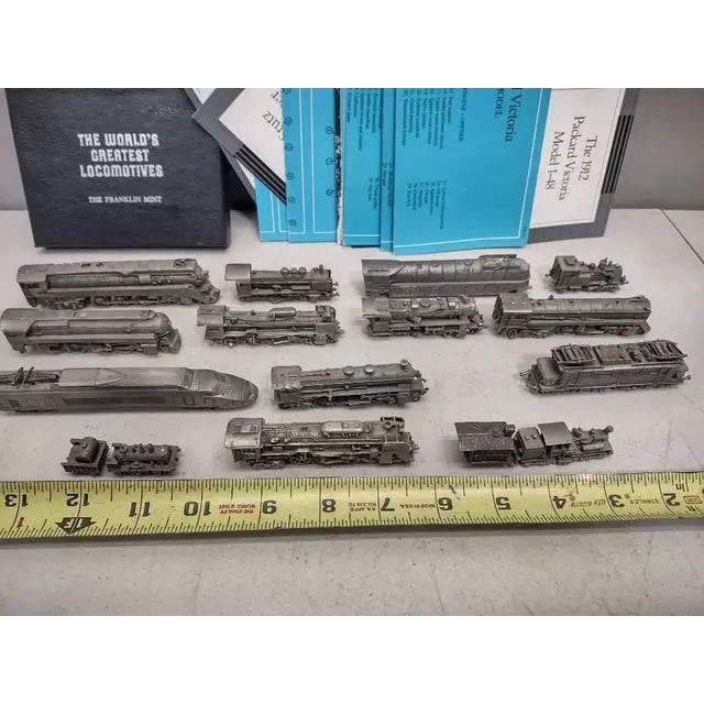 Vintage Franklin Mint pewter locomotives with documentation in mint pewter locomotives collection