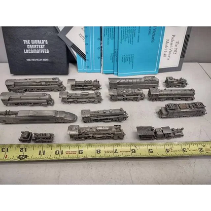Vintage Franklin Mint pewter locomotives with documentation in mint pewter locomotives collection