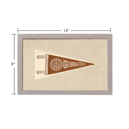 Vintage Georgia Tech pennant in brown cream frame on textured fabric