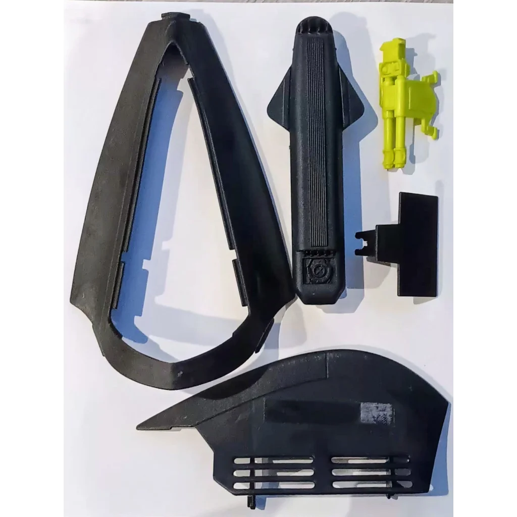 Black plastic GI Joe vehicle stealth fighter fender kit with yellow accents