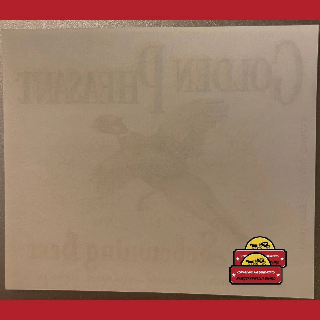 Blank whiteboard with cartoon car stickers and Rare Vintage Golden Pheasant Beer Label