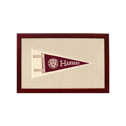 Vintage Harvard pennant in maroon with embroidered crest, framed