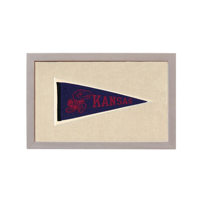 Framed vintage Kansas pennant in navy blue with red mascot