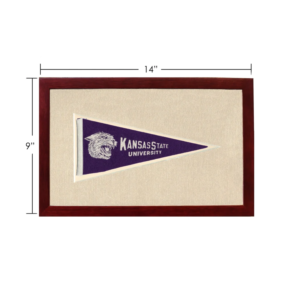 Vintage Kansas State University pennant with white wolf logo in wooden frame