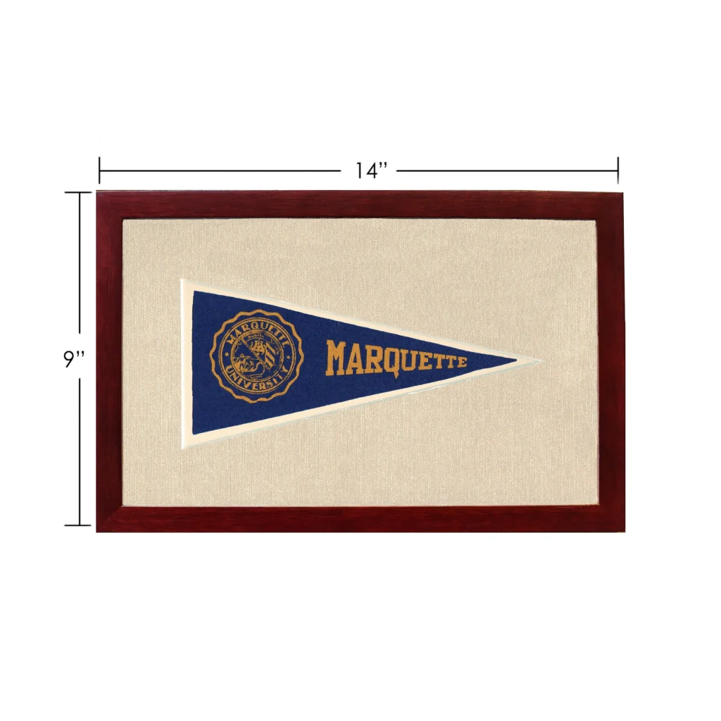 Vintage marquette university pennant in navy blue with gold lettering and emblem, framed in mahogany wood frame