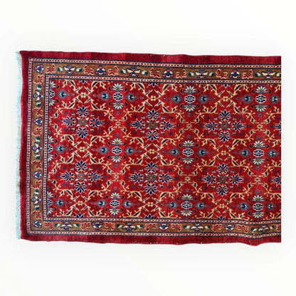 Vintage Mashhad rich red Persian runner rug with intricate floral patterns