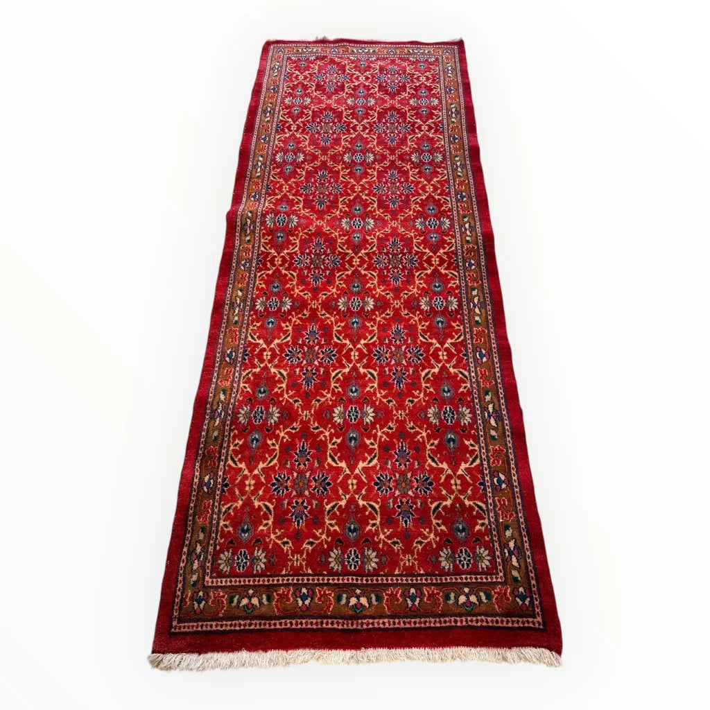 Vintage Mashhad rich red Persian runner rug with plush pile