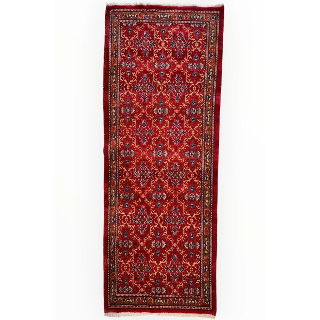 Vintage Mashhad rich red Persian runner rug with floral patterns