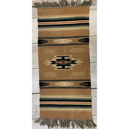 Vintage Mexican wool blanket rug with tan geometric stripes in black, white, red, green and fringed edges