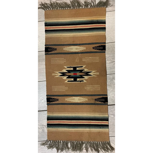 Vintage Mexican wool blanket rug with tan geometric stripes in black, white, red, green and fringed edges