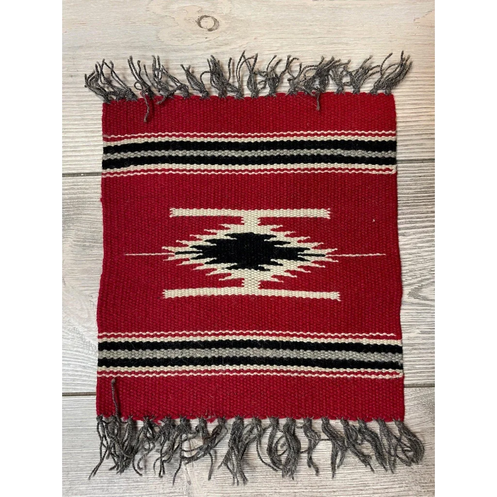 Vintage 1980s Mexican hand-knotted wool rug with bold red, black and white geometric stripes and gray fringe