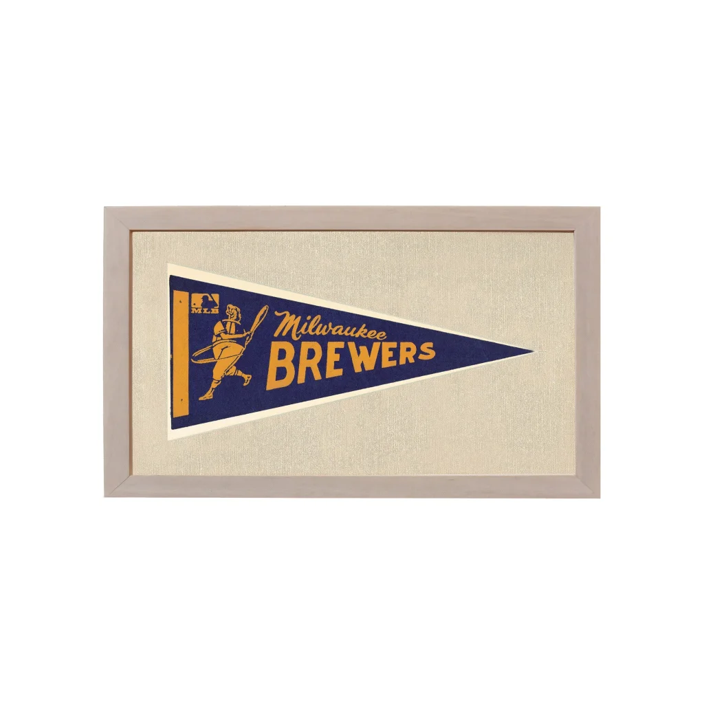 Framed vintage Milwaukee Brewers pennant in navy blue and gold