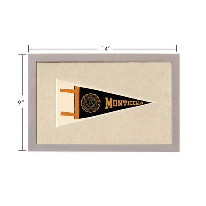 Vintage Monticello College pennant framed in black and gold