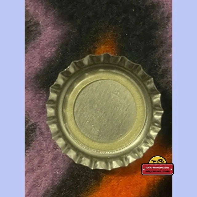 Top view of a ridged Mountain Dew bottle cap from the Rare 90s Dewshine collectible