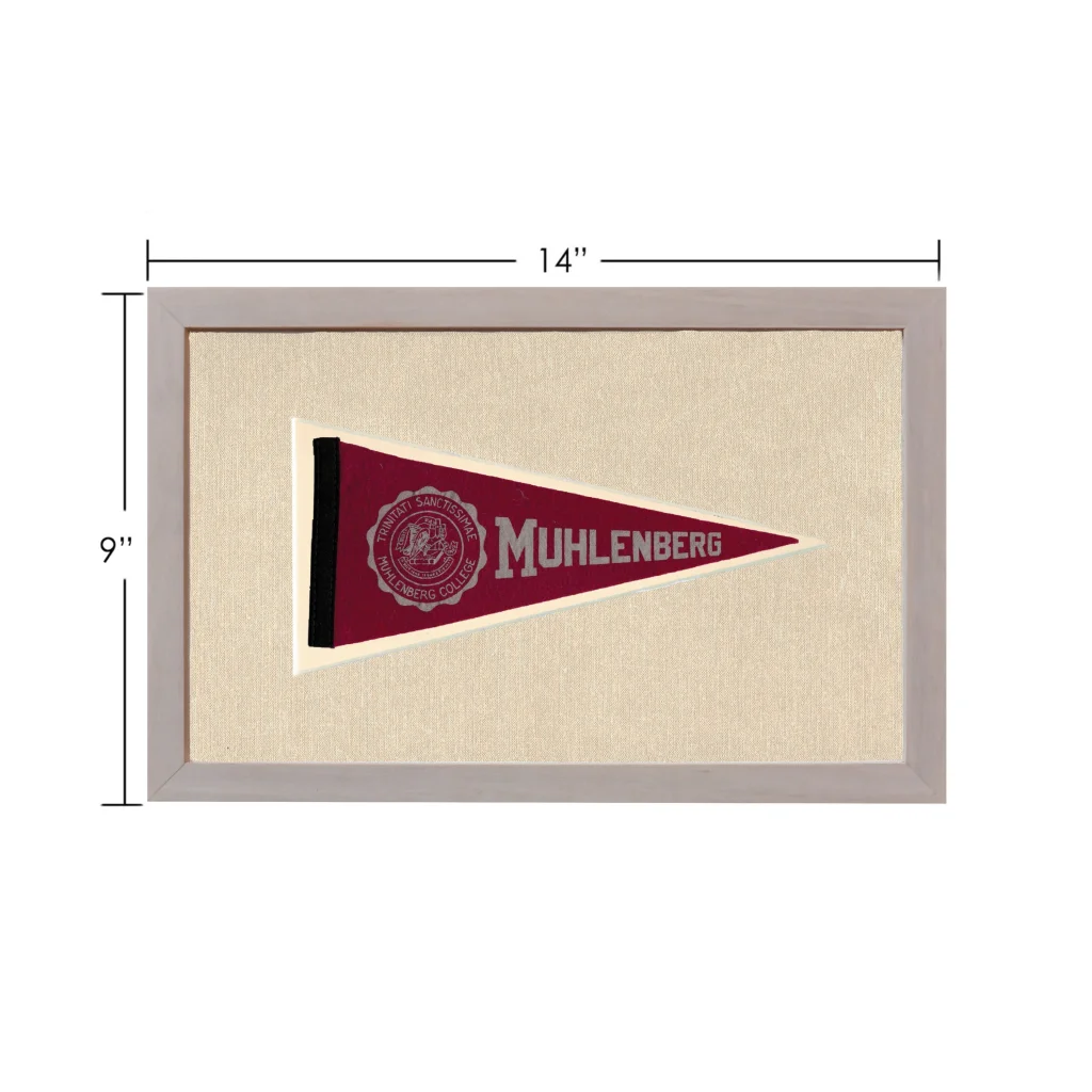 Vintage Muhlenberg College pennant in maroon with white border and black trim, framed