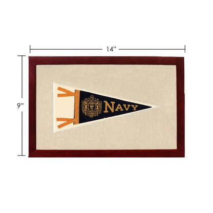 Vintage navy pennant with gold embroidered crest in dark wood frame