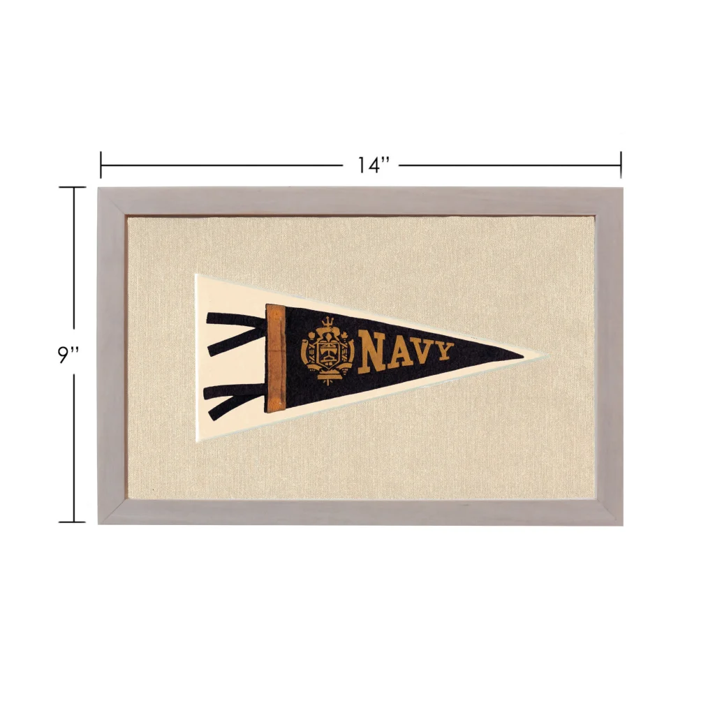 Vintage navy pennant in gray frame on beige background