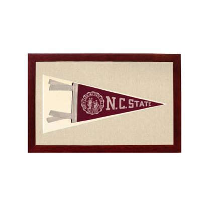 Vintage NC State pennant displaying maroon and white N.C