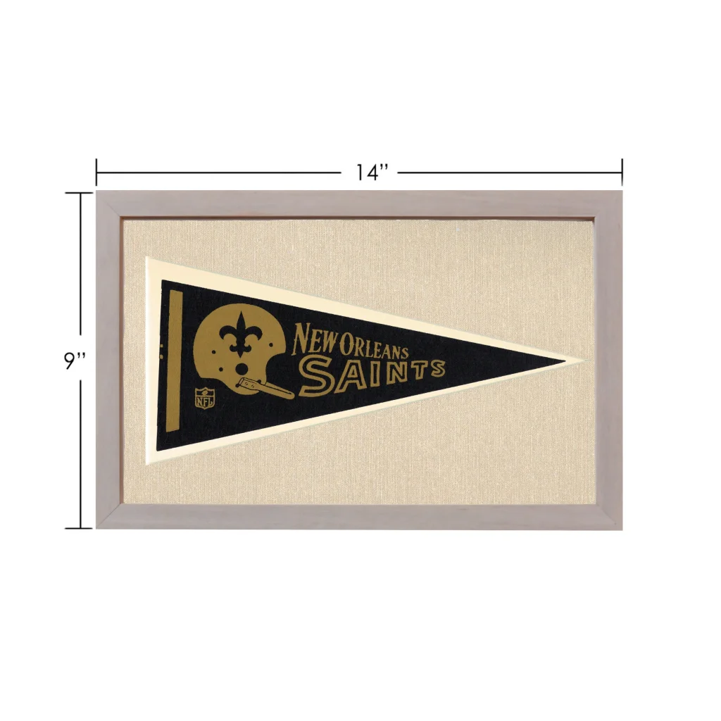 Framed vintage New Orleans Saints pennant in black, gold, and gray