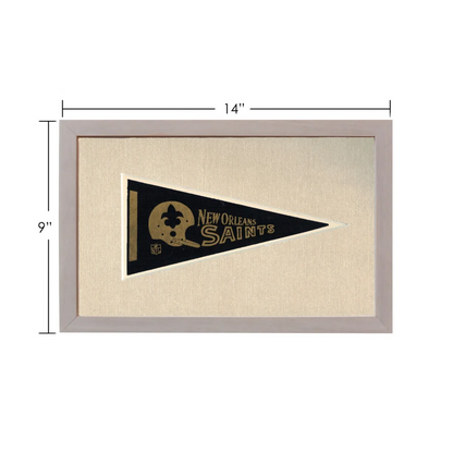 Framed vintage New Orleans Saints pennant in black, gold, and light gray