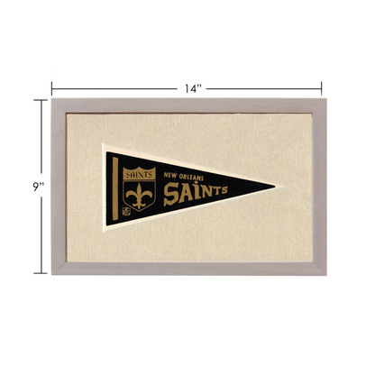 Vintage New Orleans Saints pennant in black, gold, and gray frame