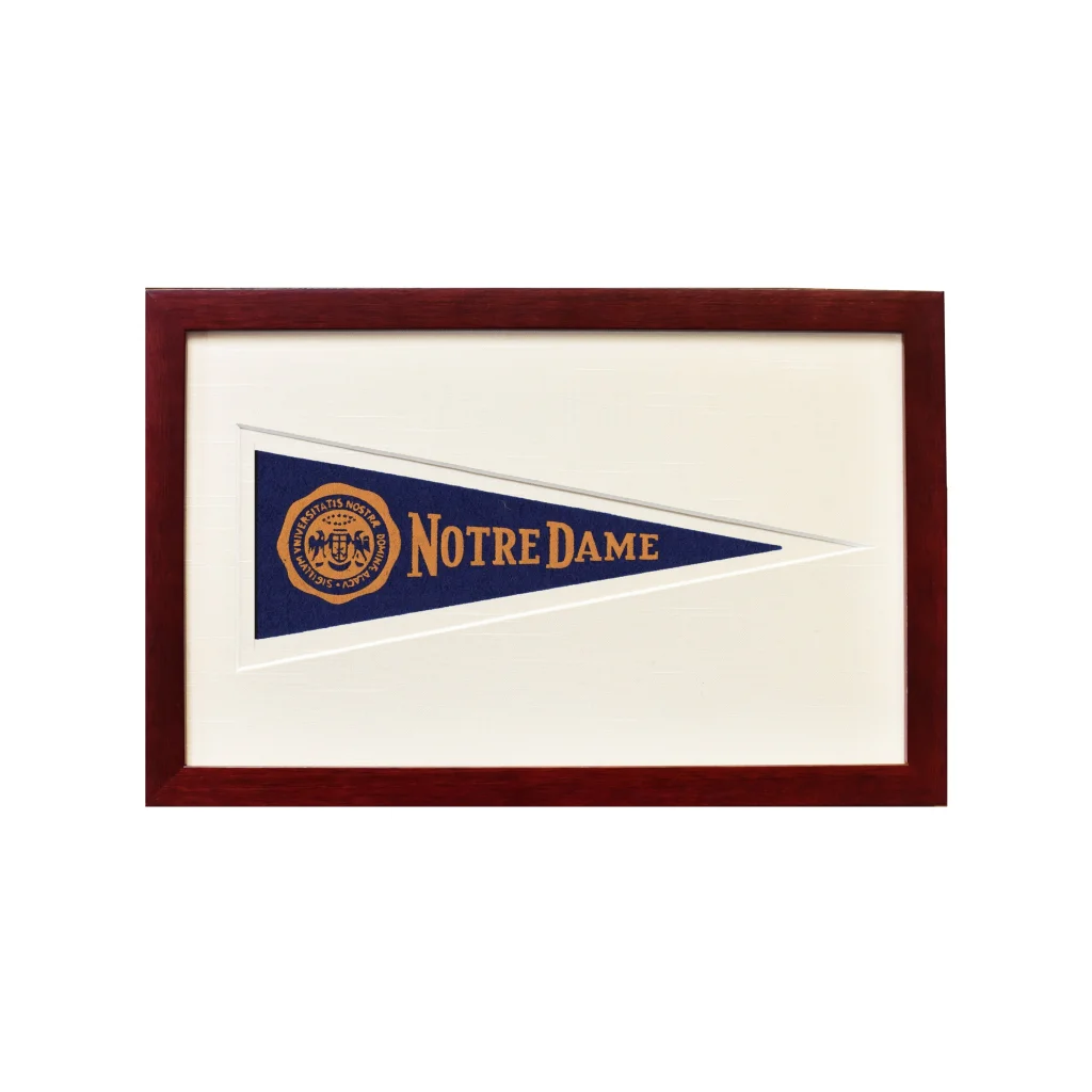 Framed vintage Notre Dame 1950s pennant flag with navy blue and gold accents