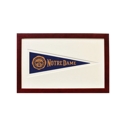 Framed vintage Notre Dame 1950s pennant flag with navy blue and gold accents
