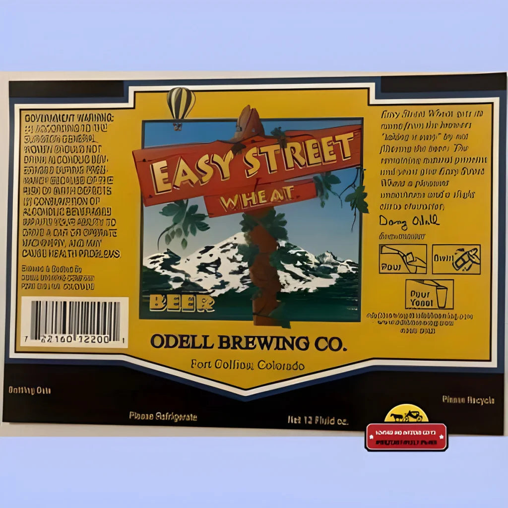 Beer label for Easy Street Wheat by Odell Brewing, showcasing a palm tree and mountain