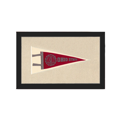 Vintage Ohio State pennant framed in red and cream on beige background