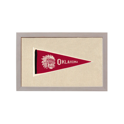 Vintage Oklahoma pennant with red base, white Native American chief, and bold stitched lettering