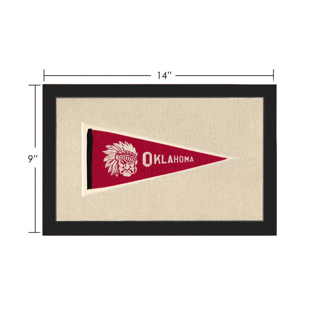 Vintage Oklahoma pennant with red design, white chief, and black frame