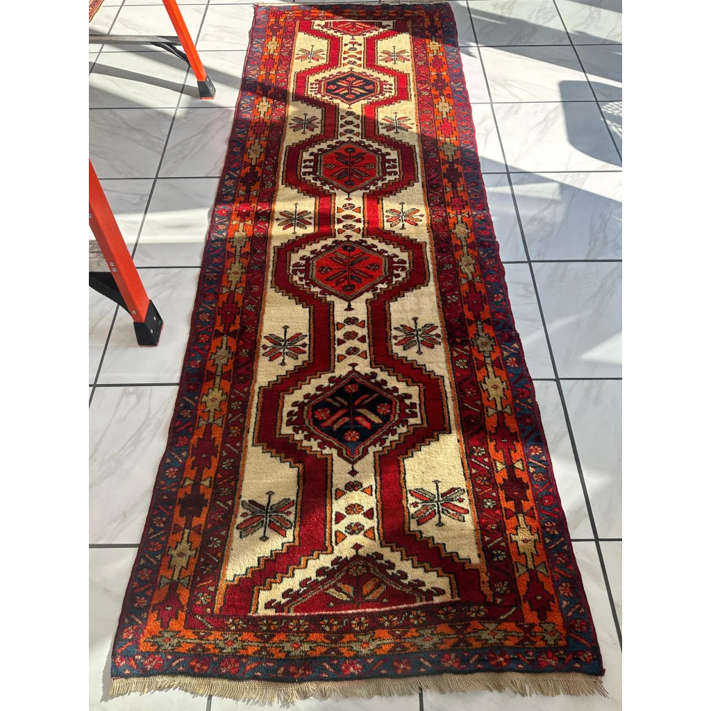 Vintage 1950s Persian Meshgi wool runner with red cream geometric patterns