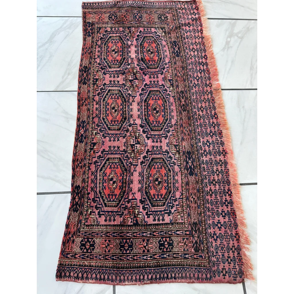 Vintage pink geometric rug in MLB career card note set break