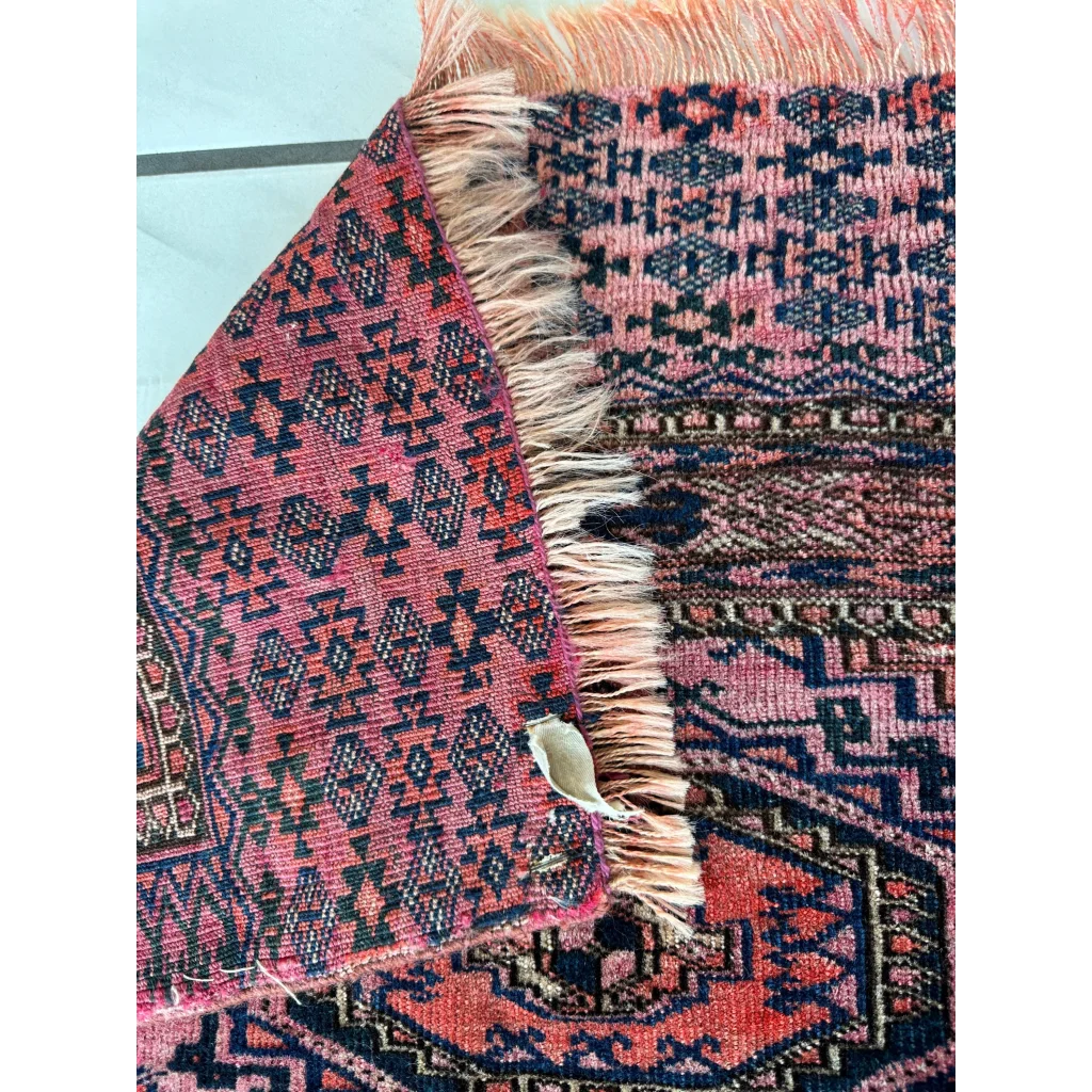 Vintage pink geometric rug with MLB career card note set break