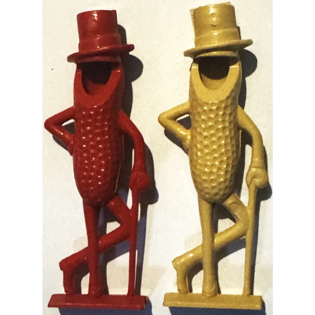 1950s Mr. Peanut whistle collectible with red and tan top hat figurines