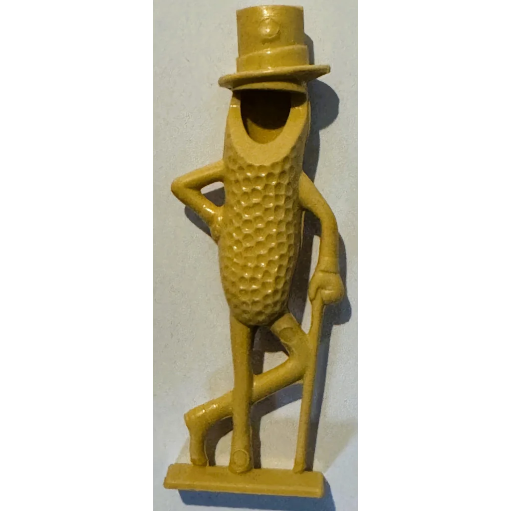 Vintage 1950s Mr. Peanut whistle: yellow plastic figurine in top hat and cane