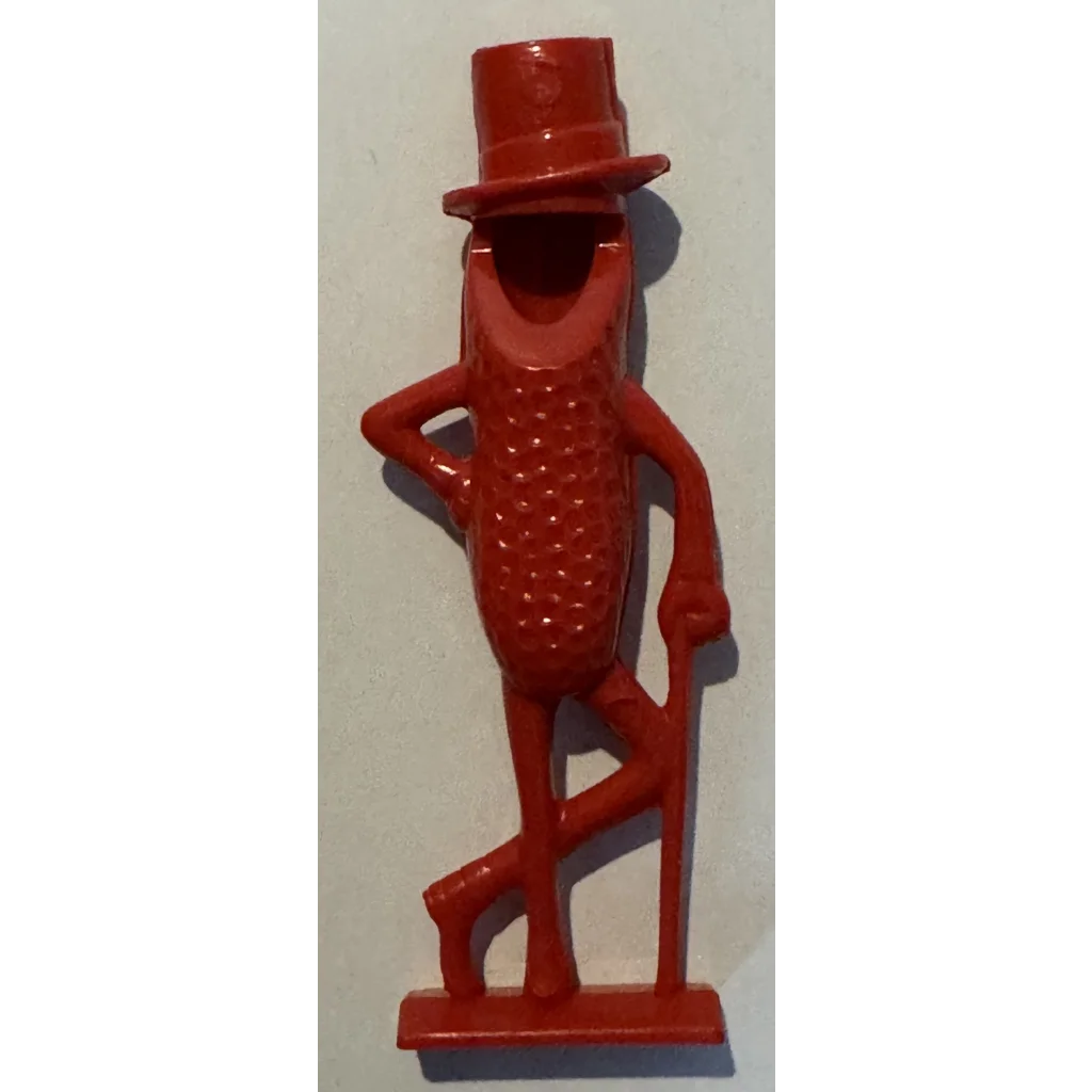 Vintage 1950s Mr. Peanut whistle collectible figurine in red plastic with top hat and cane